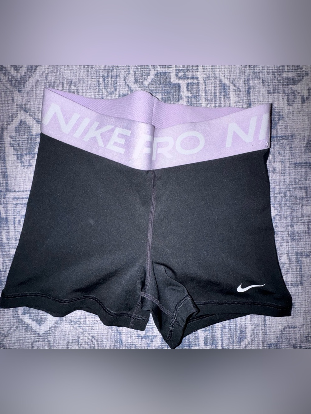 Nike pro with purple waistband